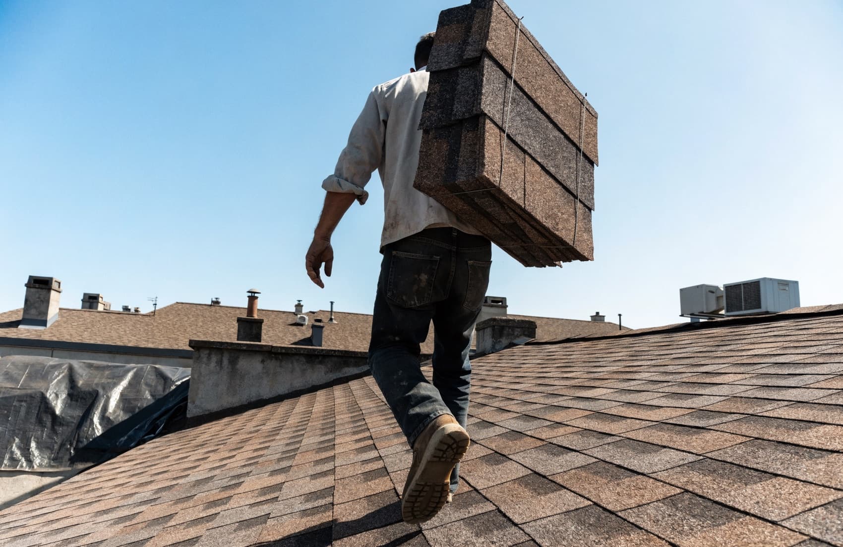 A roofing crew finishing a job that came from a top map pack listing