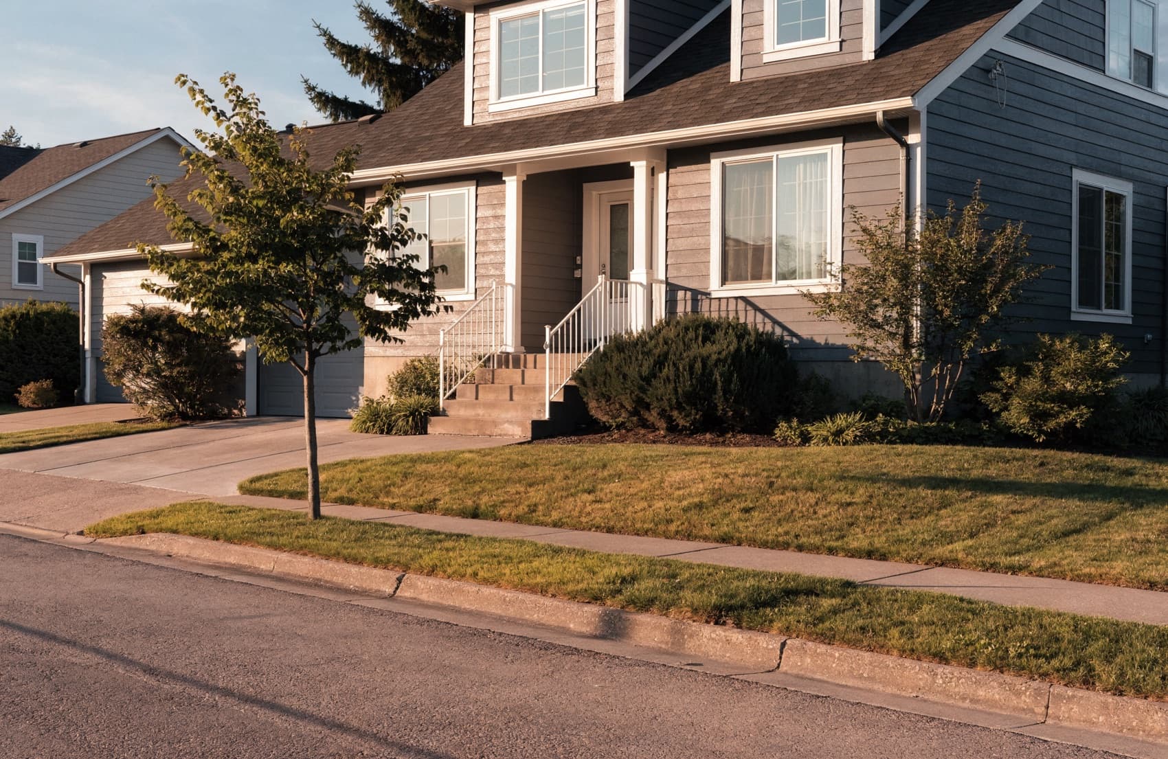 A newly finished home exterior representing a contractor website built to win local jobs